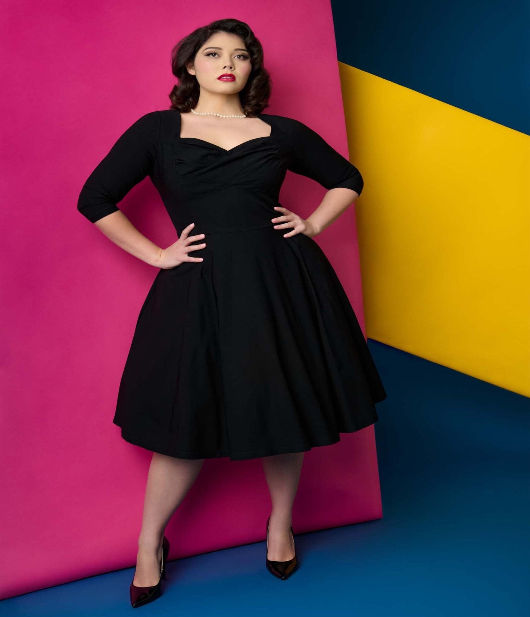 Unique Vintage Plus Size 1950s Black Pleated Bust Swing Dress