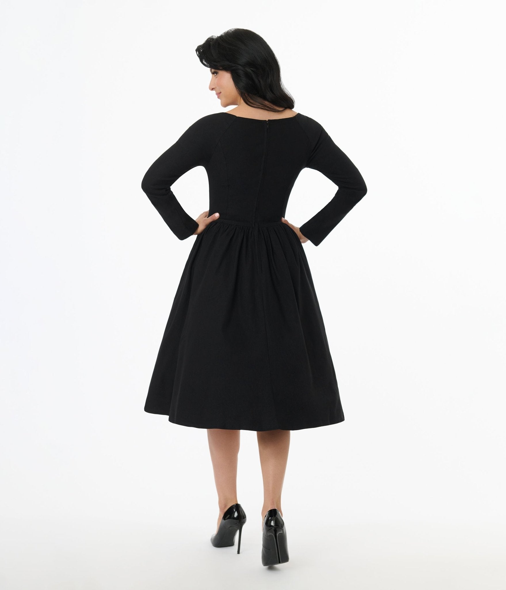 Unique Vintage 1950s Solid Black Sweetheart Swing Dress