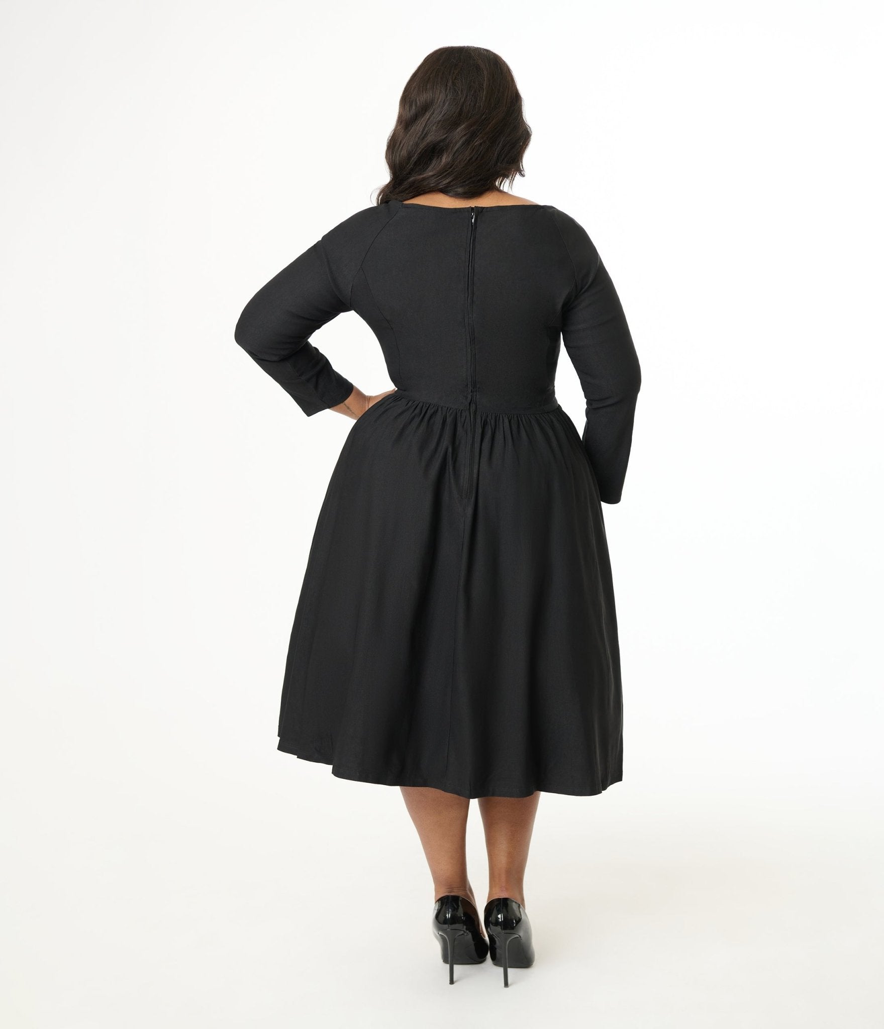 Unique Vintage Plus Size 1950s Solid Black Sweetheart Swing Dress