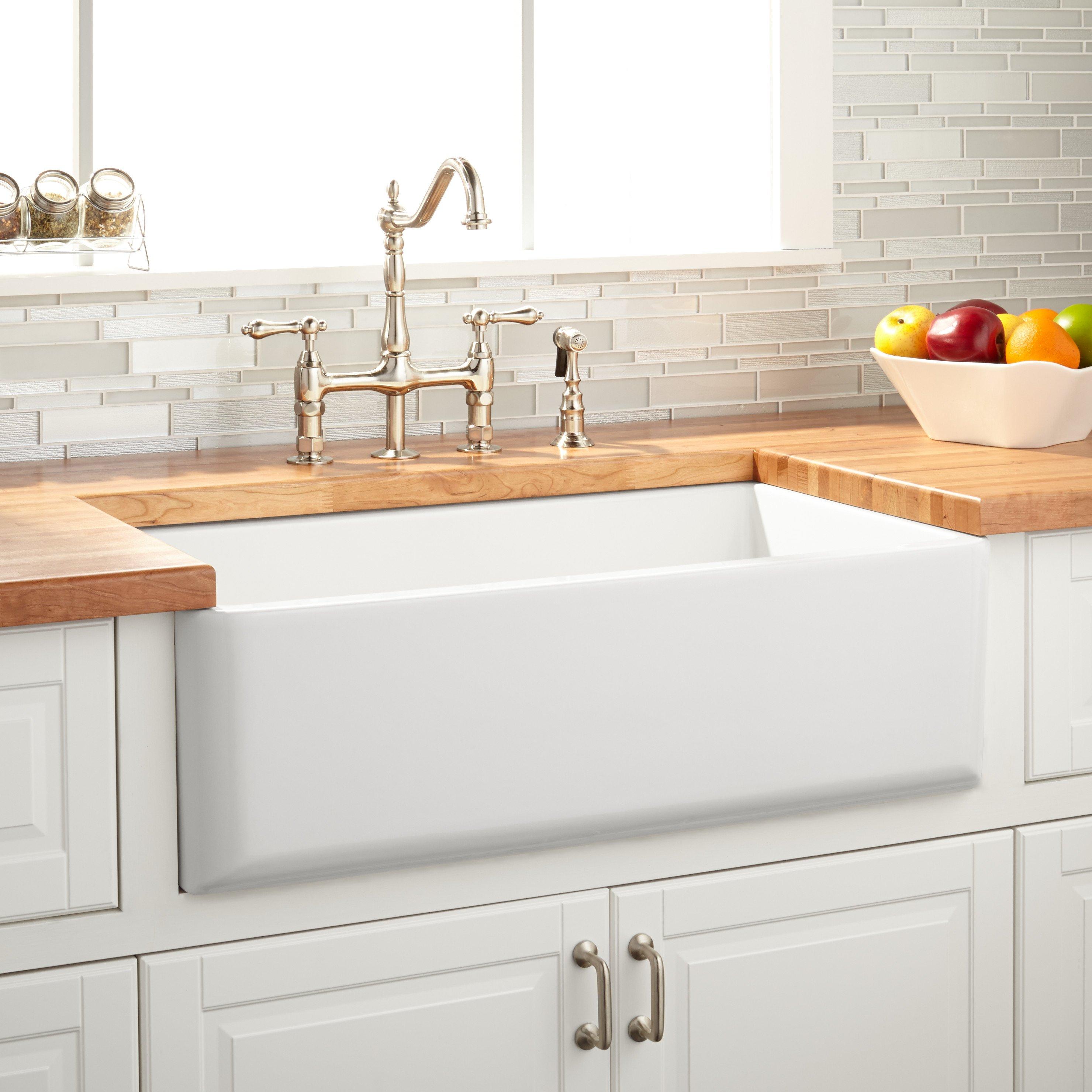 838 x 460 x 254 (33 x 18 x 10) Solid - Reversible Flat Face/Curved End/Bottom Face Single Bowl Fireclay Farmhouse Sink - White