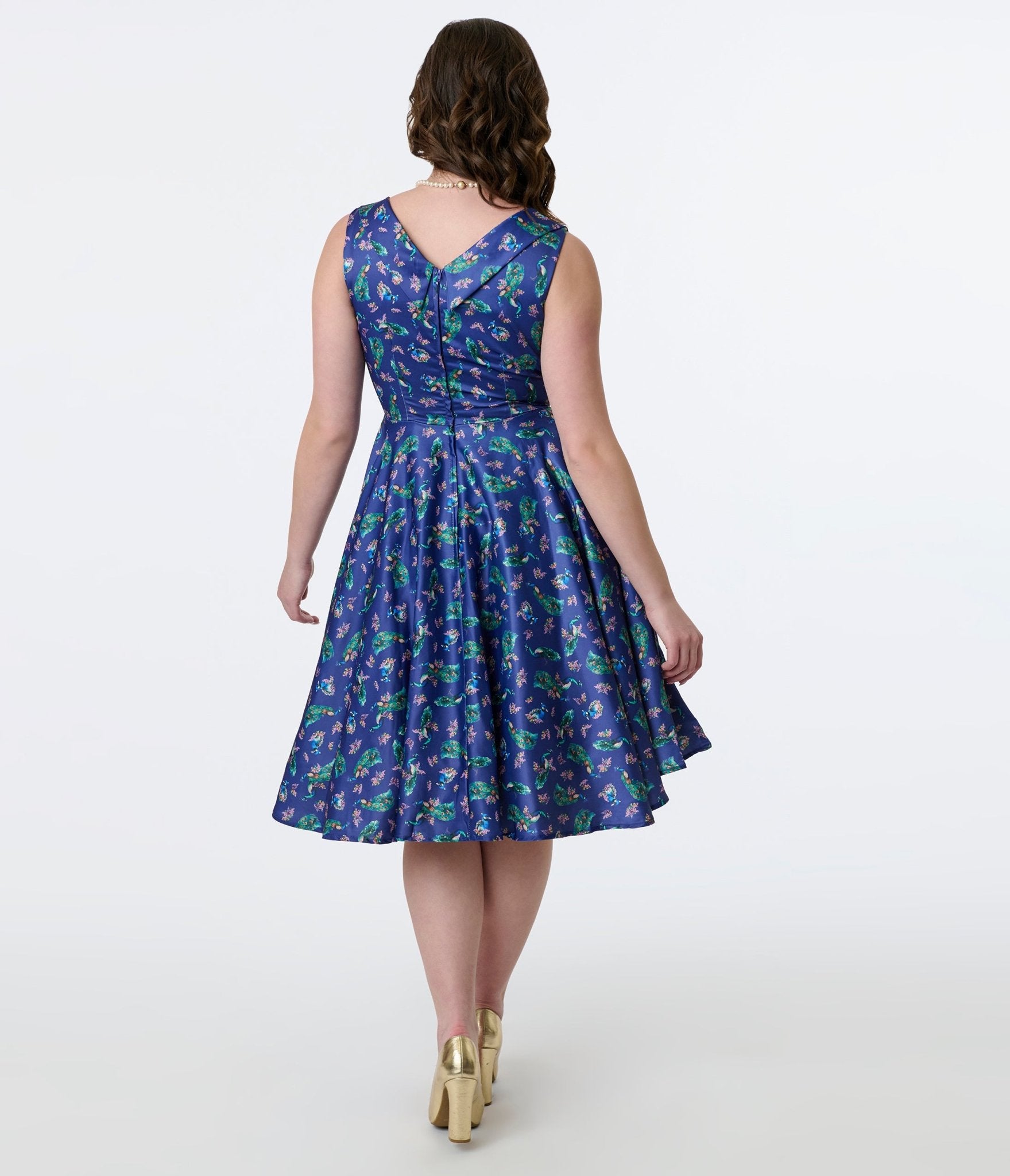 Dolly & Dotty 1950s Purple & Teal Peacock Print Grace Swing Dress