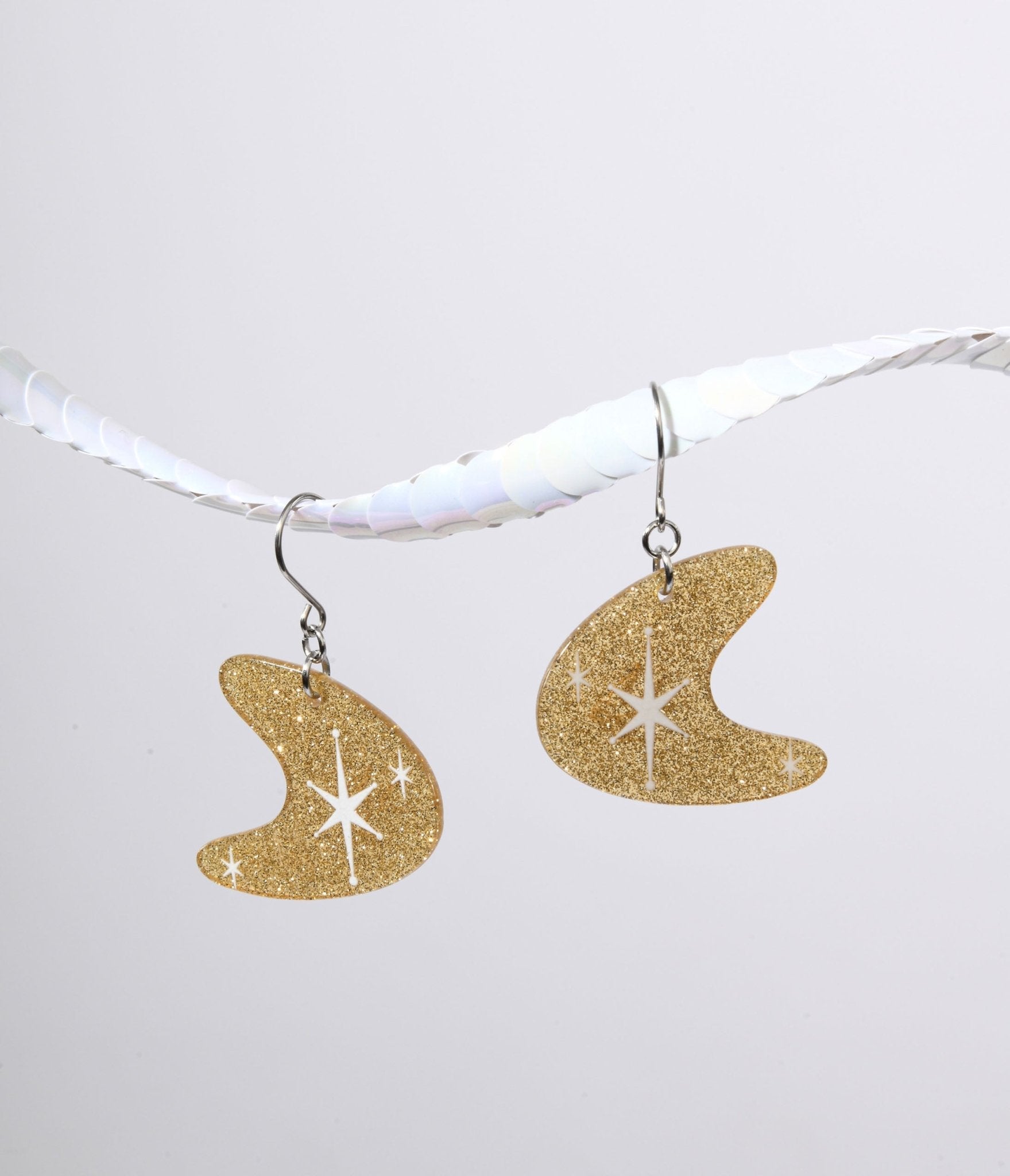 Gold Glitter Atomic Boomerang Dangle Earrings