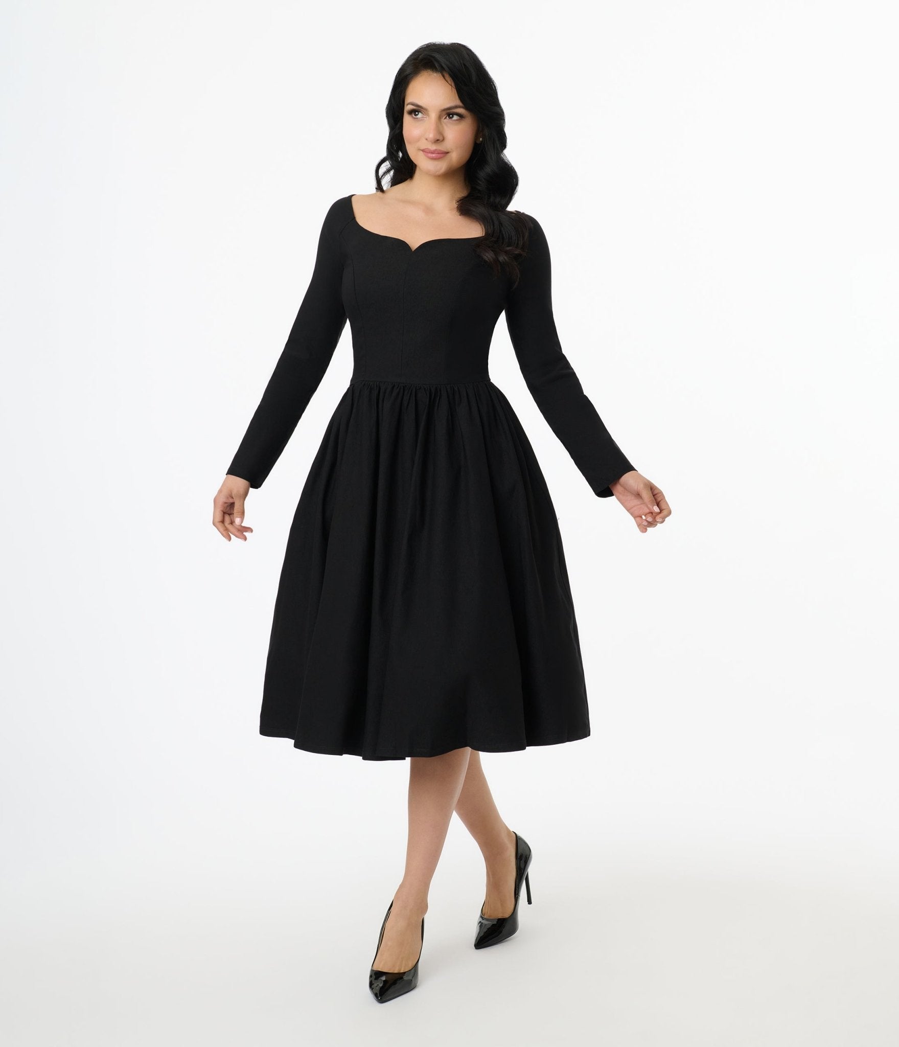 Unique Vintage 1950s Solid Black Sweetheart Swing Dress